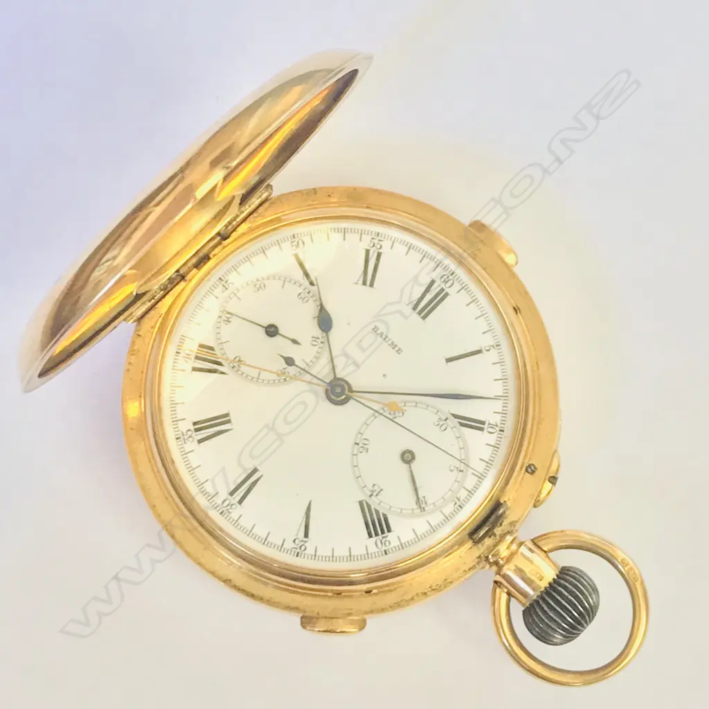 18ct gold hunter cased split seconds chronograph pocket watch, by Baume (Longines) Image 1++