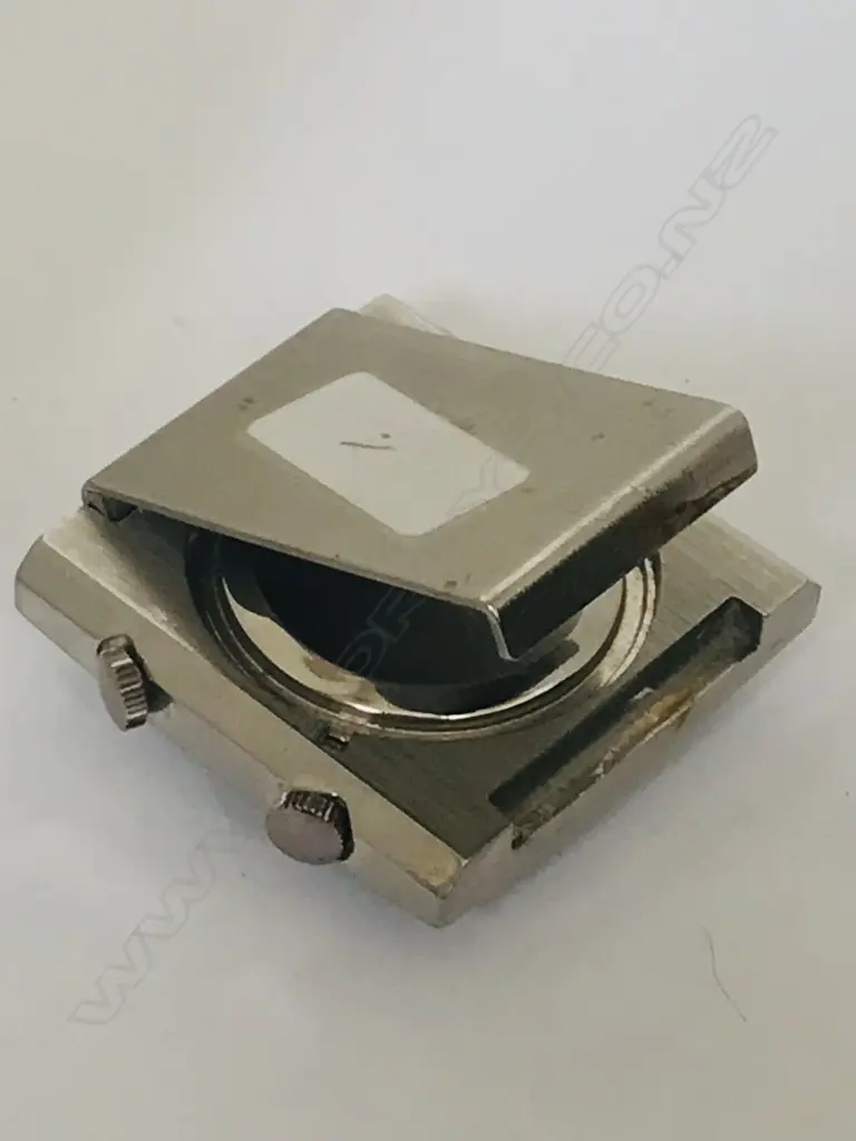 Swiss Türler small travel alarm clock with folding easel back. Image 1++