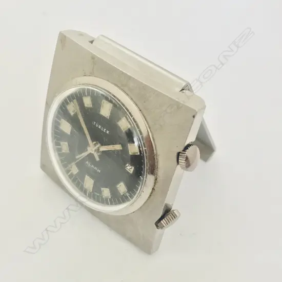 Swiss Türler small travel alarm clock with folding easel back.