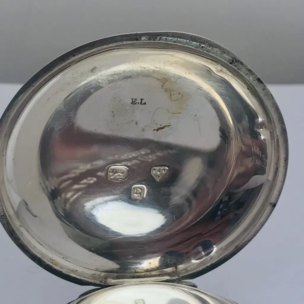 A Victorian silver deck / pocket watch in half hunter case hallmarked Chester 1879, Image 1++
