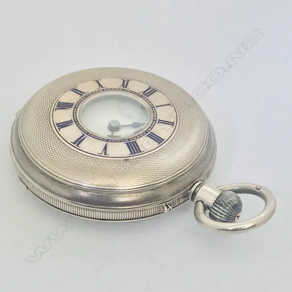 A Victorian silver deck / pocket watch in half hunter case hallmarked Chester 1879, Image 1++