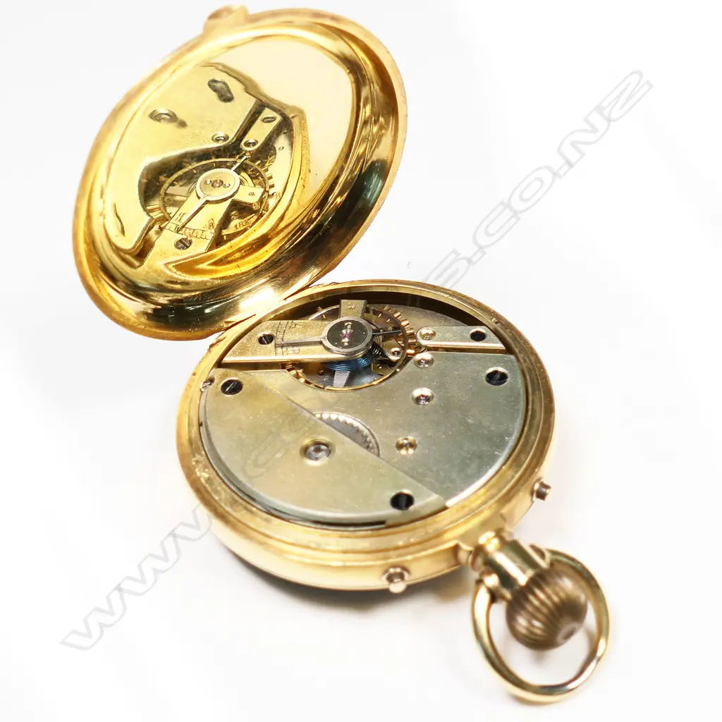 An 18ct gold Swiss open face pocket watch, Image 1++
