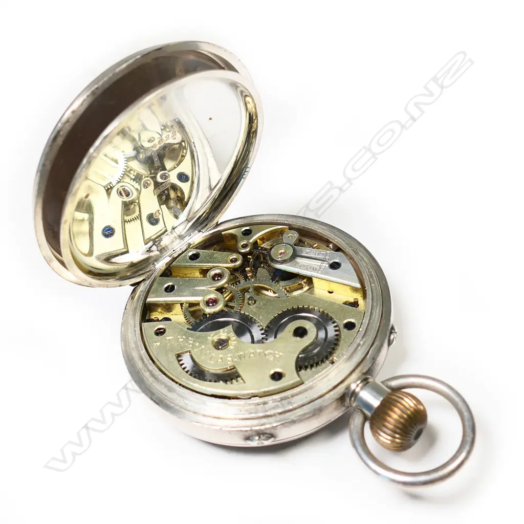 A large Swiss 8-day nickel cased pocket watch, Image 1++