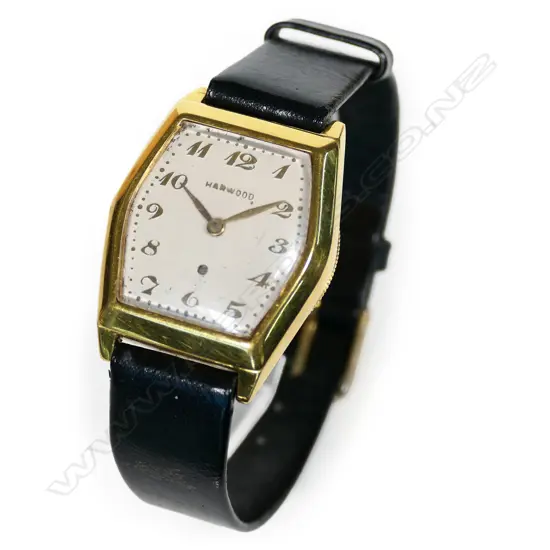A rare vintage gold Harwood back set wristwatch,