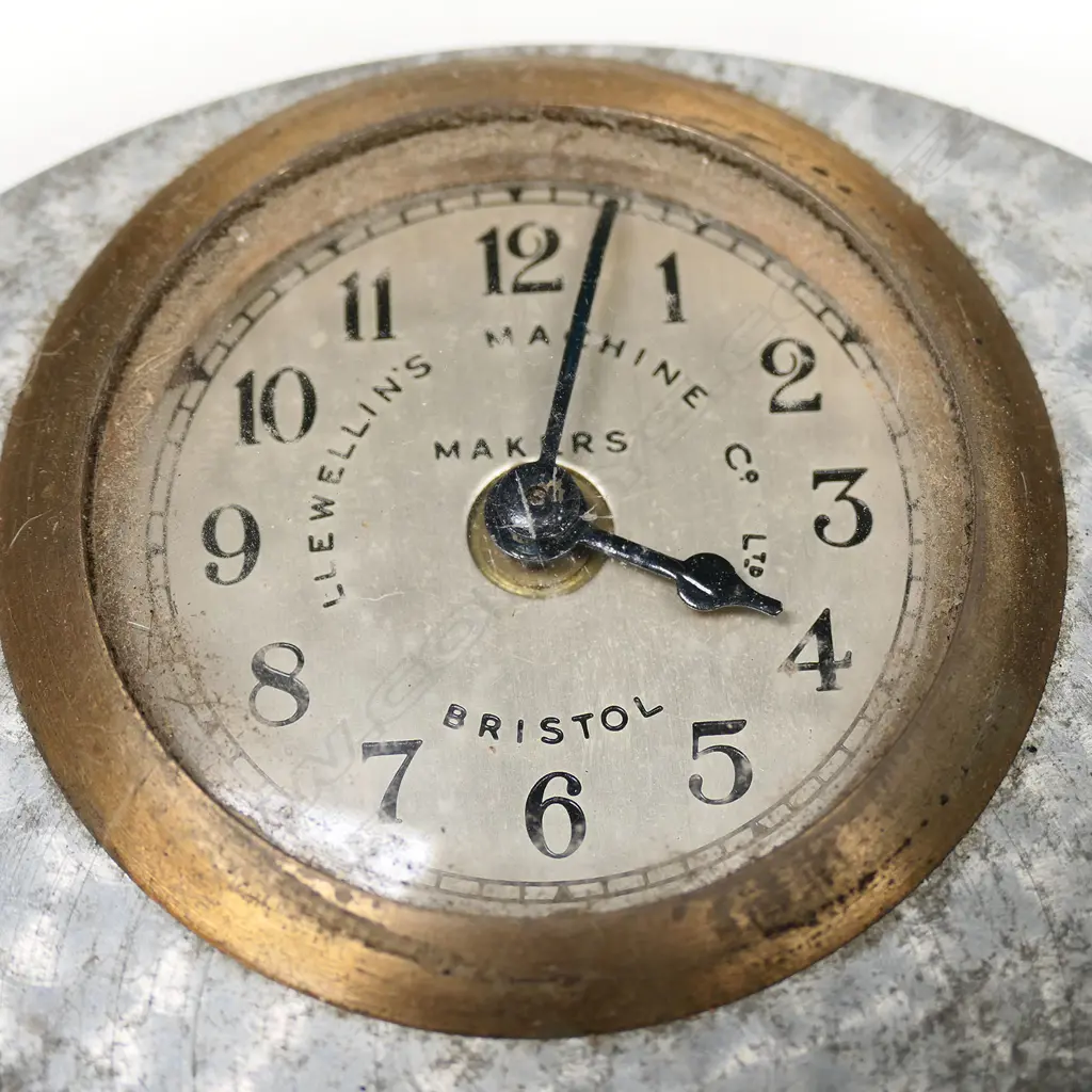 A vintage Llewellins Machine Co. Ltd. portable night watchman's clock. Image 1++