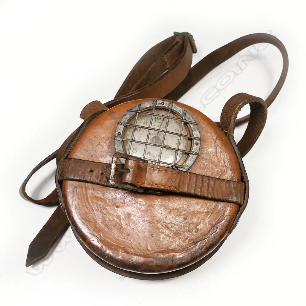 A vintage Llewellins Machine Co. Ltd. portable night watchman's clock. Image 1++