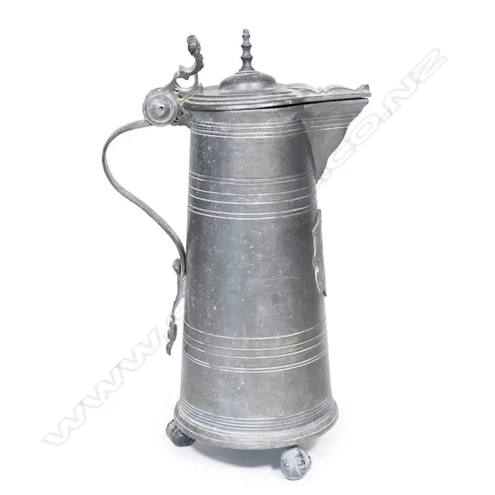 A 19thC tall Swiss pewter flagon,