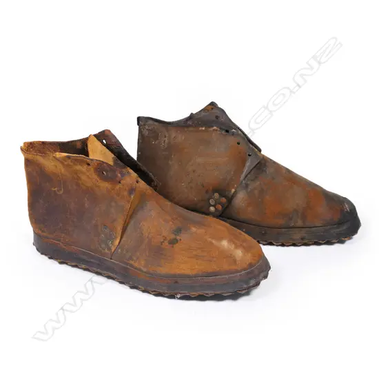 An uncommon pair of 19thC wine stomping boots with hobnail soles.