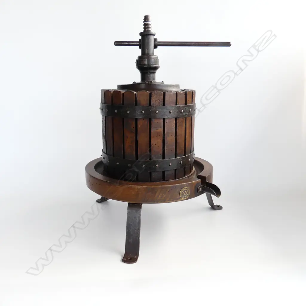 An antique French wine press with exterior slatted wood cage, Image 1++