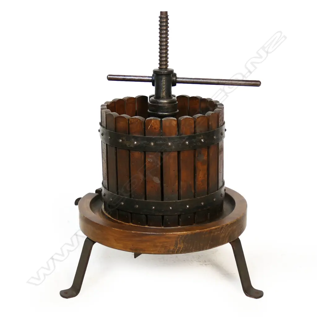 An antique French wine press with exterior slatted wood cage, Image 1++