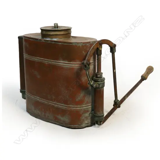 A vintner’s old copper backpack sprayer,
