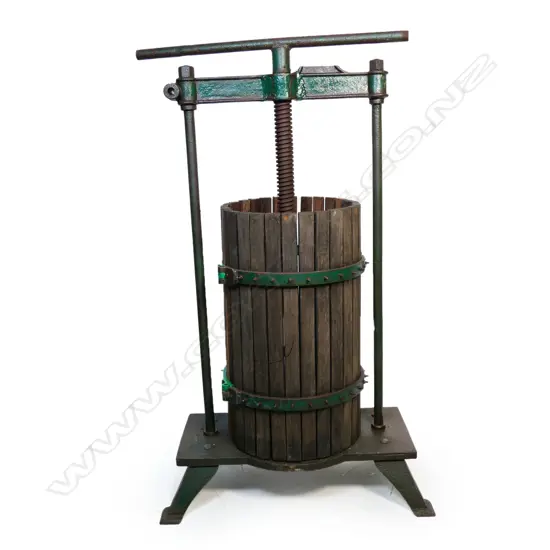 A large vintage farm made tall cast iron wine press with cage,