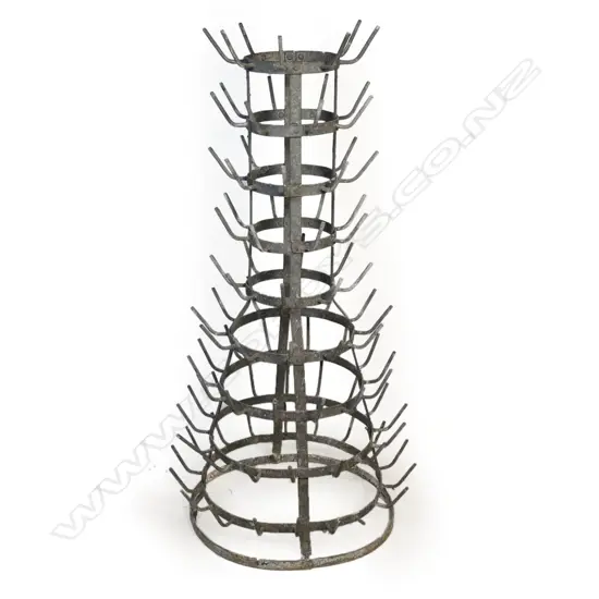 An old French metal bottle drier,