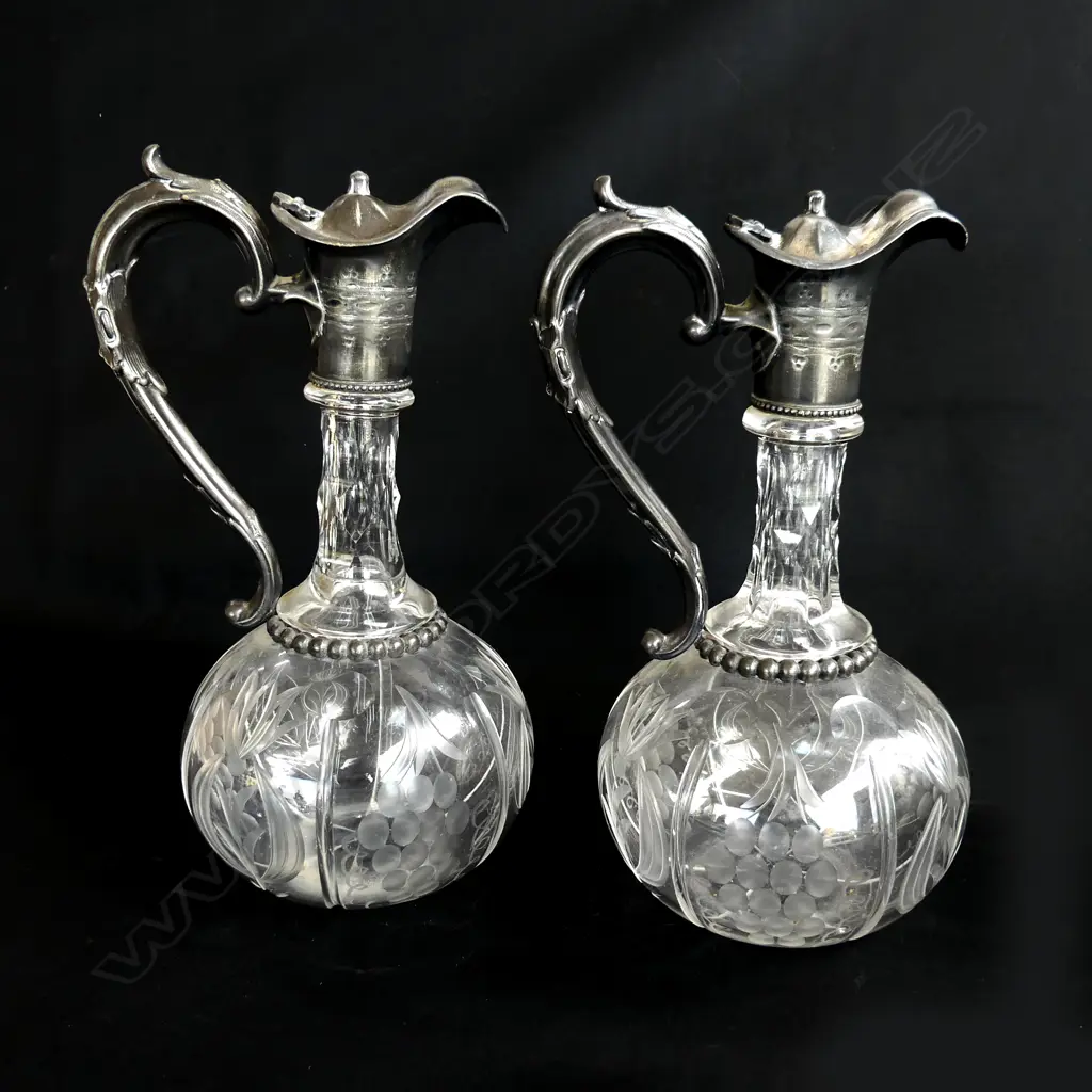 A pair of silver plate  cut and etched crystal duckbill decanters, Image 1++