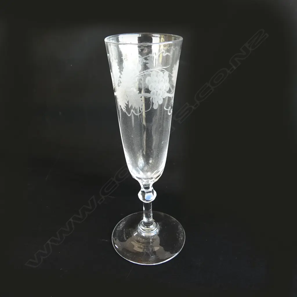 A champagne glass with grapevine etching, Image 1++