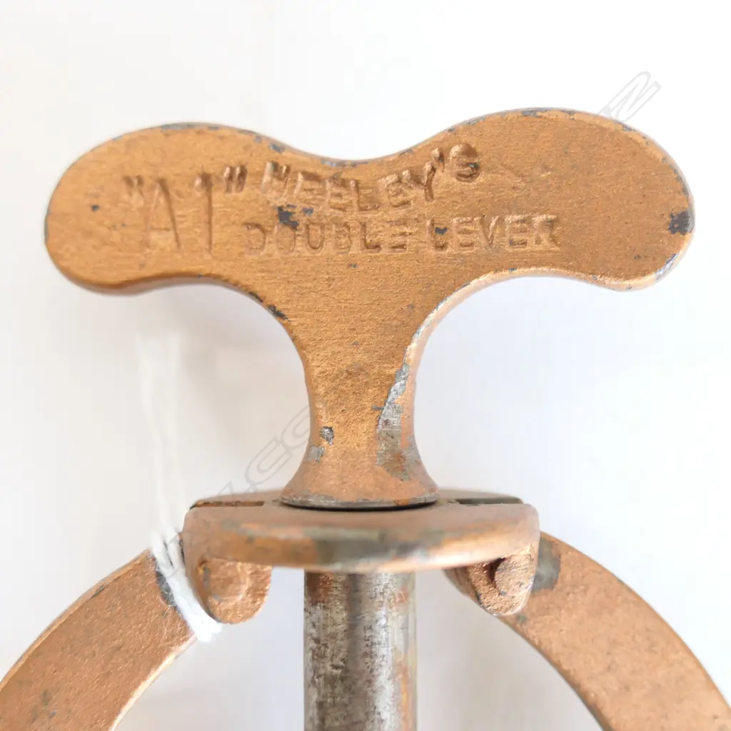 An 1888 James Henley & Sons double-lever corkscrew, Image 1++