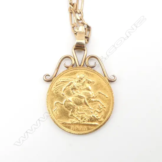 1911 FULL GOLD SOVEREIGN AND 9CT GOLD MOUNT AND CHAIN 5.46gms (chain)