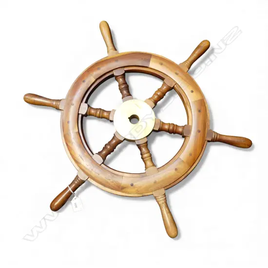 Mahogany ship's wheel turned 6 spoke with brass central fitting. Dia.610mm.