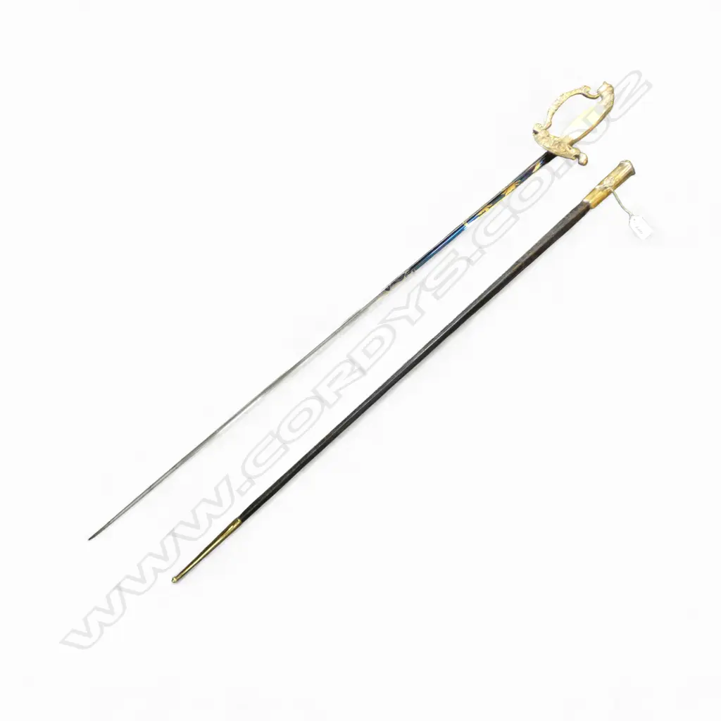 c.1900 FRENCH GILT BRASS & MOP COURT SWORD. Black leather scabbard. Fancy blued tri-form steel blade. L.990mm. Image 1++