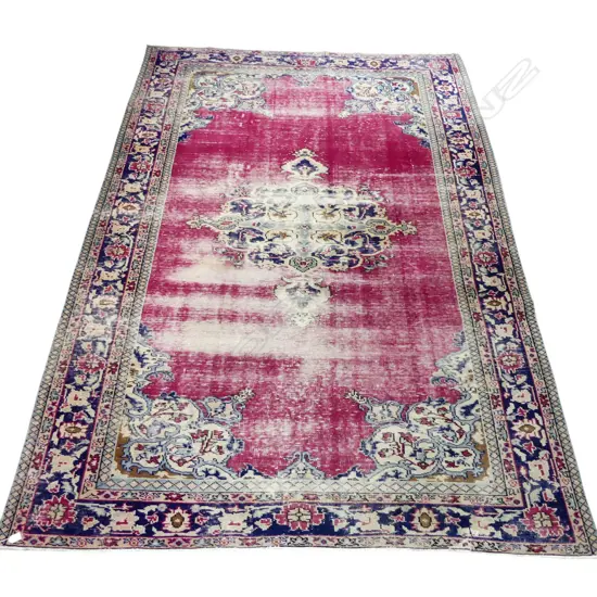 HAND KNOTTED WOOL PILE RUG, MAROON GROUND, WORN 2840x1970mm