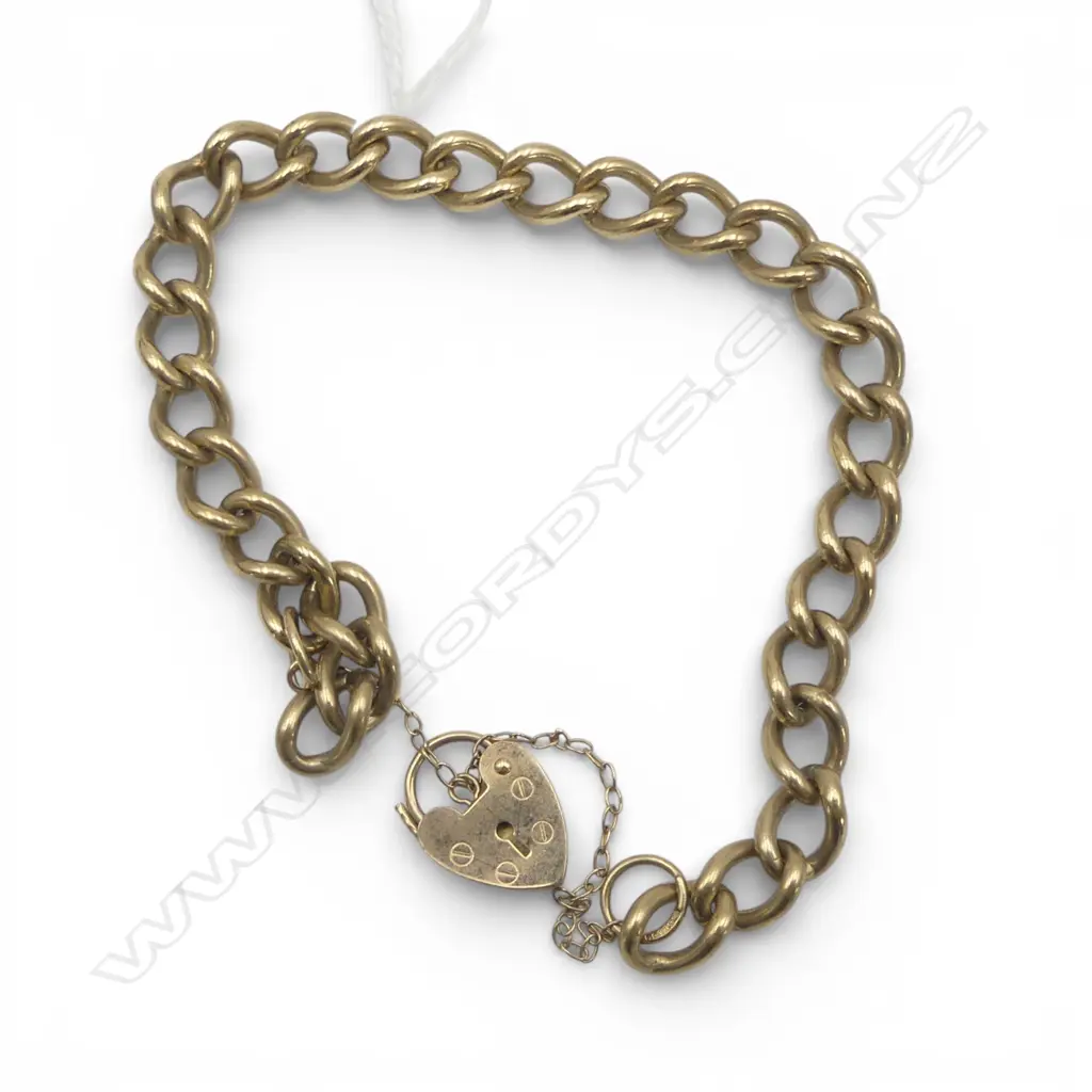 9ct gold curb link bracelet with heart padlock clasp & safety chain. 18.1gms. Image 1++