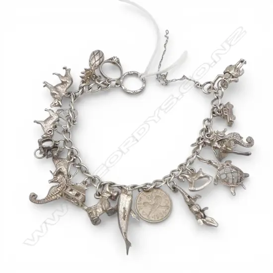 SILVER CHARM BRACELET, 41.44gm needs clasp & safety chain repair