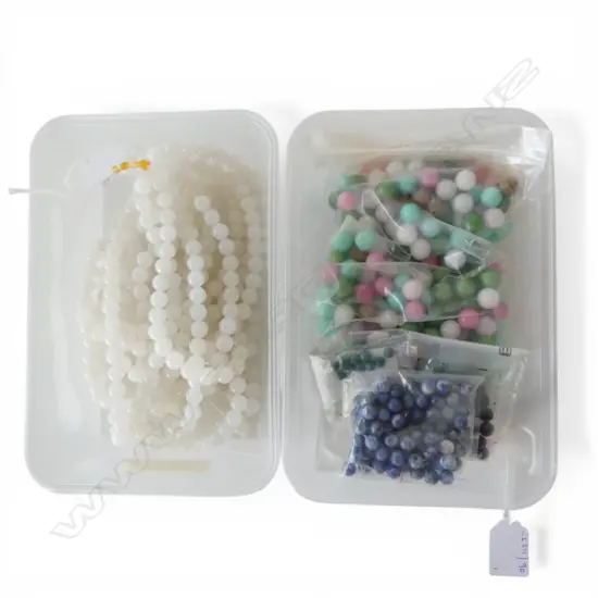 2 CONTAINERS OF COSTUME BEAD JEWELLERY