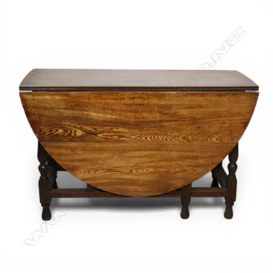 c.1900 oak country drop leaf gate leg dining table four plank top turned supports. 1480 x 1130 x 715mm.