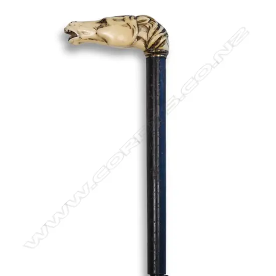 A c1900 carved ivory horse head handle parasol/umbrella,