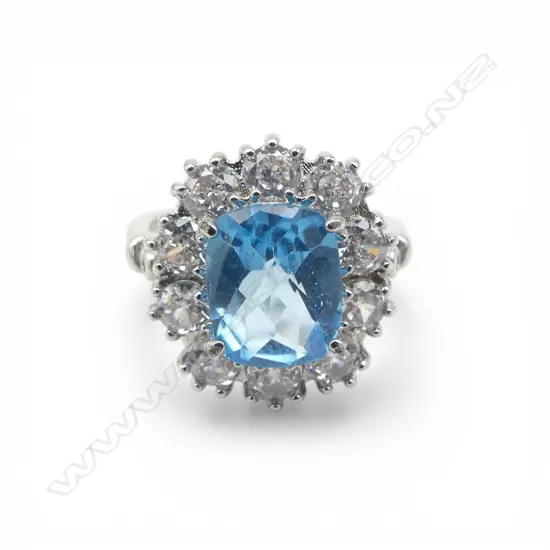 SILVER PLATED BLUE TOPAZ & CZ RING, AIG REPORT