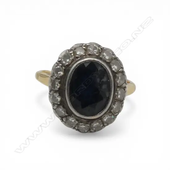 18CT GOLD SAPPHIRE AND DIAMOND RING 3.48gms (SAPPHIRE CHIPPED) SIZE K