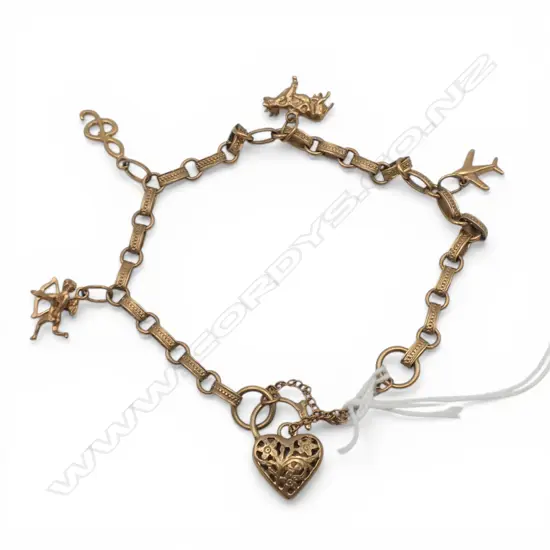 9ct GOLD VINTAGE CHARM BRACELET cupid + plane + cow etc. 14gms
