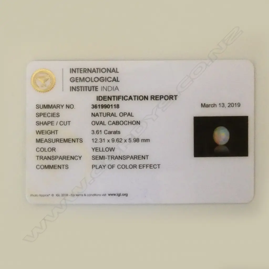 OPAL CABOCHON, 3.61ct, yellow transparent, identification report  Image 1++
