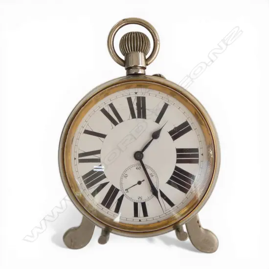Large chrome pocket watch with Roman numerals to the enamel + seconds dial, minor damage. On plated strut. 