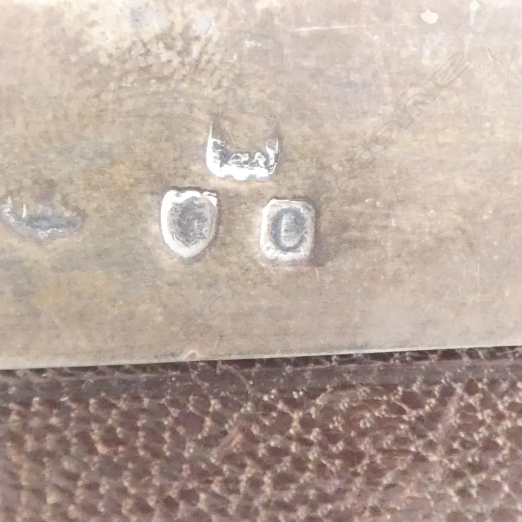 A very large Victorian period silver cased pocket watch stand enclosing a large chrome pocket watch Image 1++