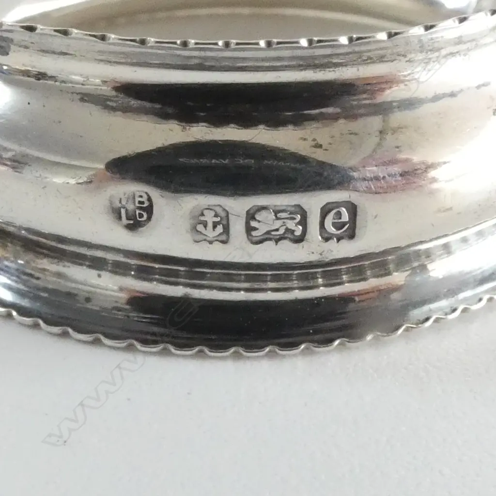 ASST STG SILVER: 4 SPOONS + 2 NAPKIN RINGS 77gms + small silver vase w weighted base 41gms Image 1++