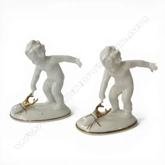 2 GERMAN PORCELAIN PUTTI FIGURINES H.120mm