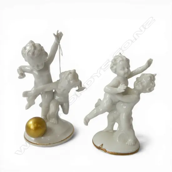 2 GERMAN PORCELAIN PUTTI FIGURINES one repaired by Wrightways Studio H.180mm