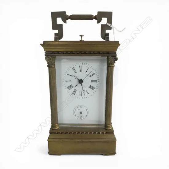 LARGE BRASS REPEATER CARRIAGE CLOCK Corinthian column cnrs. Bell strike. Nearly running for a minute then stops. H.185m 
