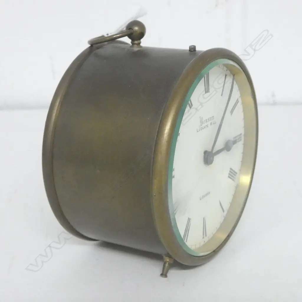 EARLY 20thC BENSON (London) BRASS CASED DESK CLOCK. Quality running brass movement. Enamelled dial. With key. Dia.97mm. Image 1++