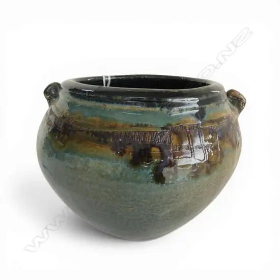 # George Kojis (USA/NZ. 1942-) ovoid vase / jardiniere with fine incised decoration and small lug handles. H.180mm