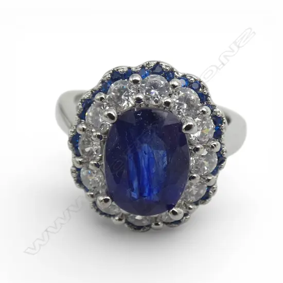 SAPPHIRE & CZ RING  in plated mount, STONE=AIG CERT, stone heat treated, enhanced w lead glass & colour, adjustable size
