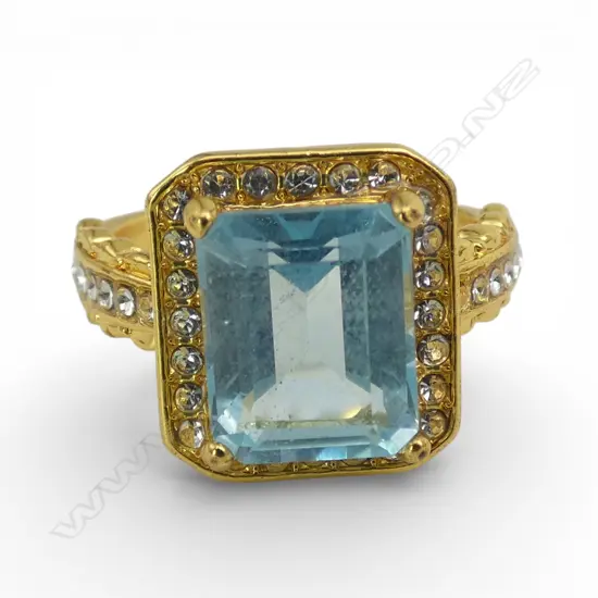 BLUE TOPAZ & CZ RING  in plated mount, STONE=AIG CERT