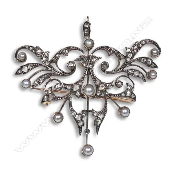 A Victorian 9ct gold and silver diamond and pearl pendant/brooch,