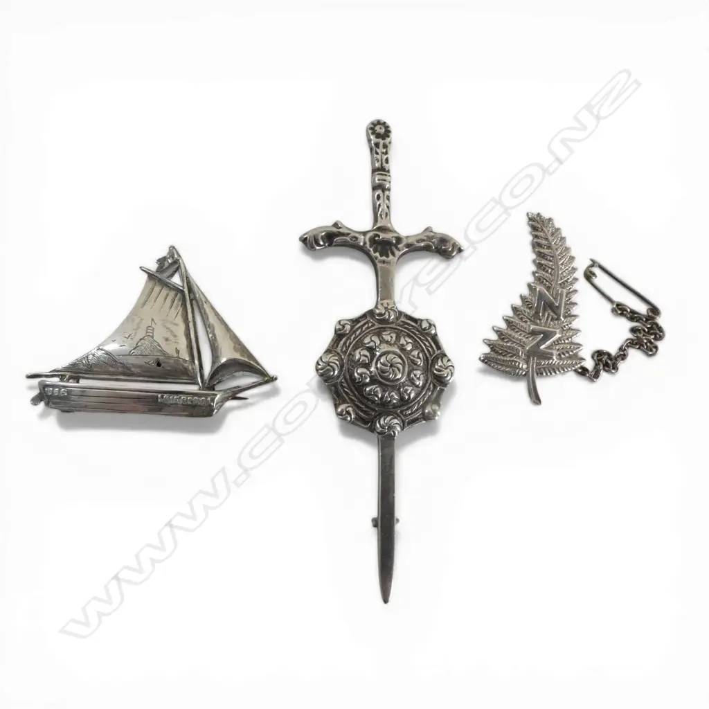 3 SILVER BROOCHES: YACHT + NZ FERN + SCOTTISH SILVER SWORD & SHIELD BROOCH (kilt pin) 18gms Image 1++