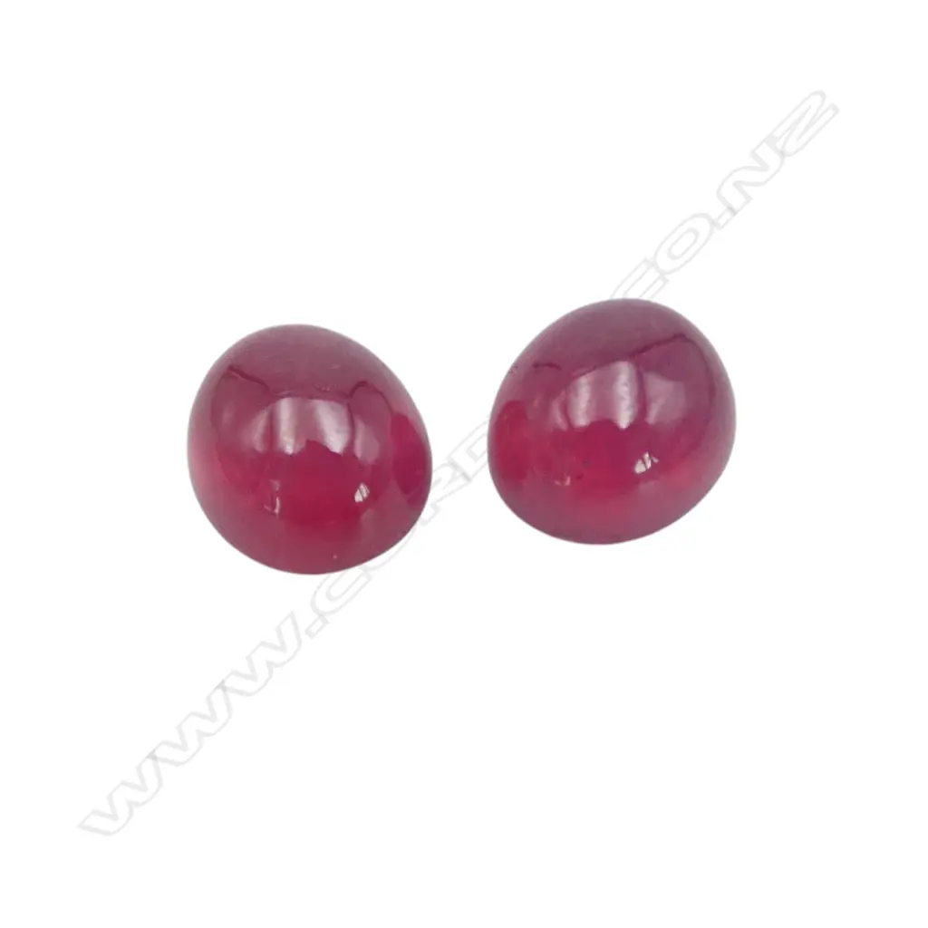 TWO RUBIES (TREATED) CABOCHONS - 30.40CTS Image 1++