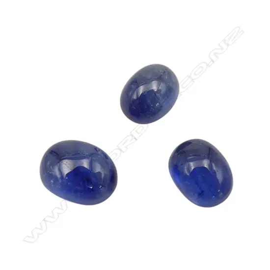 THREE SAPPHIRE colour enhanced CABOCHONS - 8.32CTS