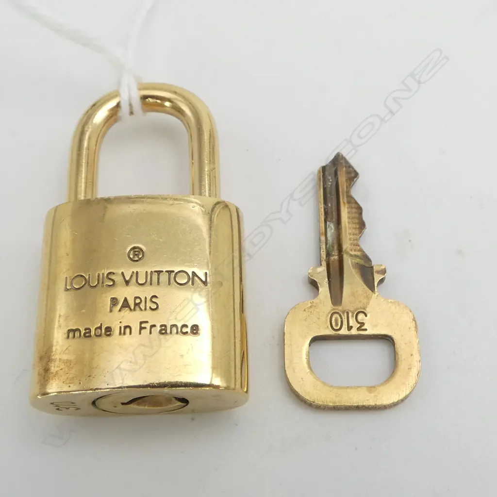 LOUIS VUITTON SML PADLOCK w KEY #310, authentification from myhaute.co.nz Image 1++