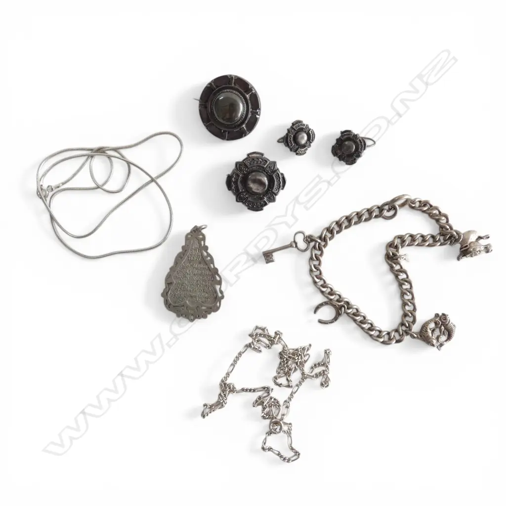2 SILVER NECKLACES + CHARM BRACELET + PENDANT + 2 BROOCHES + PR EARRINGS 44gms Image 1++
