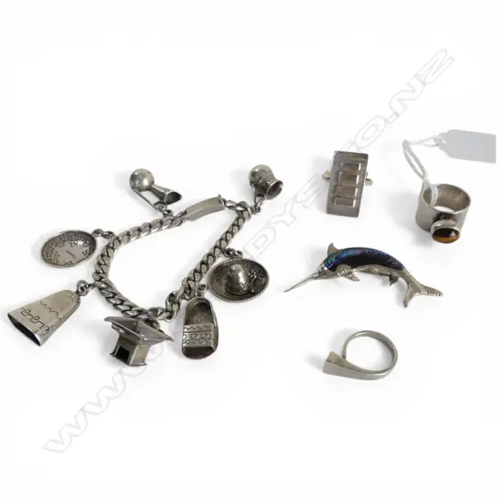 5 PCES STG SILVER; 3 RINGS, CHARM BRACELET, MARLIN BROOCH, 63gms